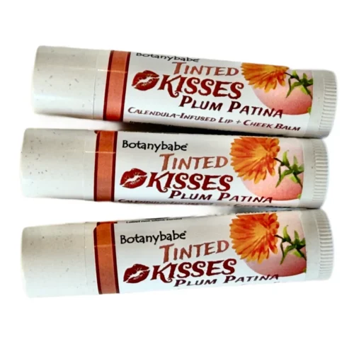 3 plum patina tubes on white background